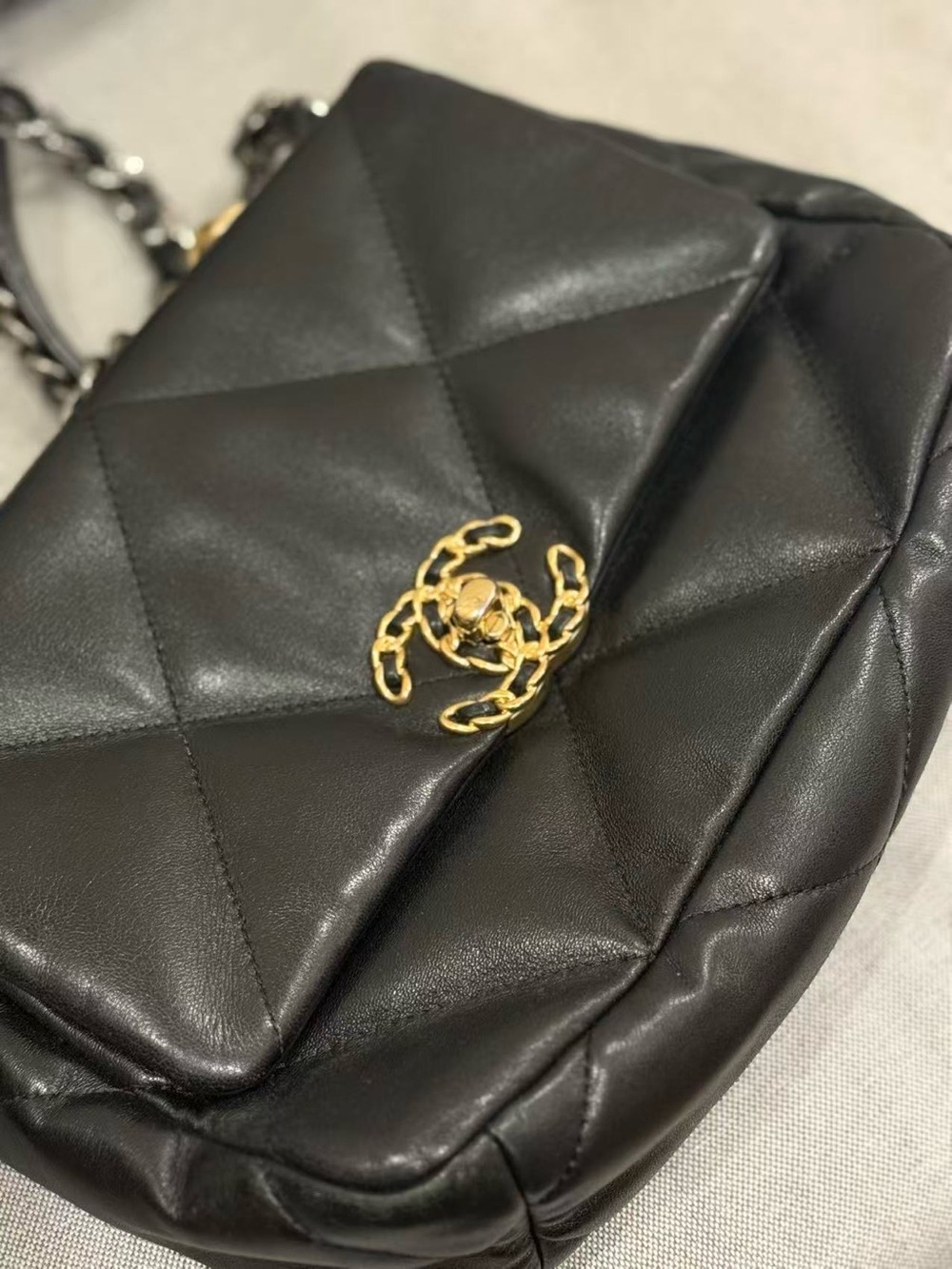 Black Quilted Leather Shoulder Bag with Gold Chain Accent